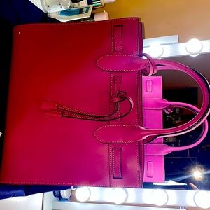 Dooney & Bourke fuchsia tassel tote